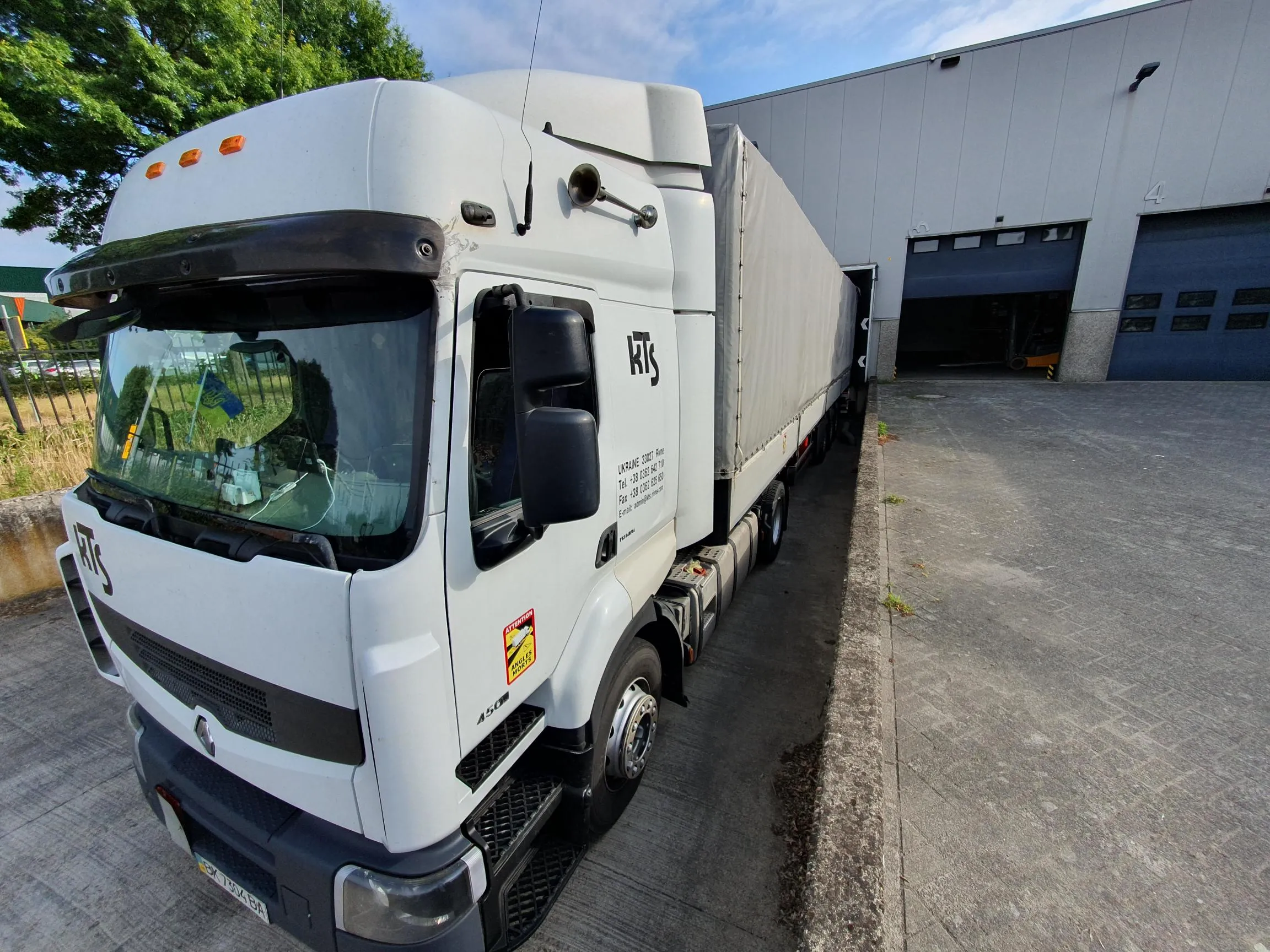 A truck heading for Ukraine with solar panels leaving the warehouse