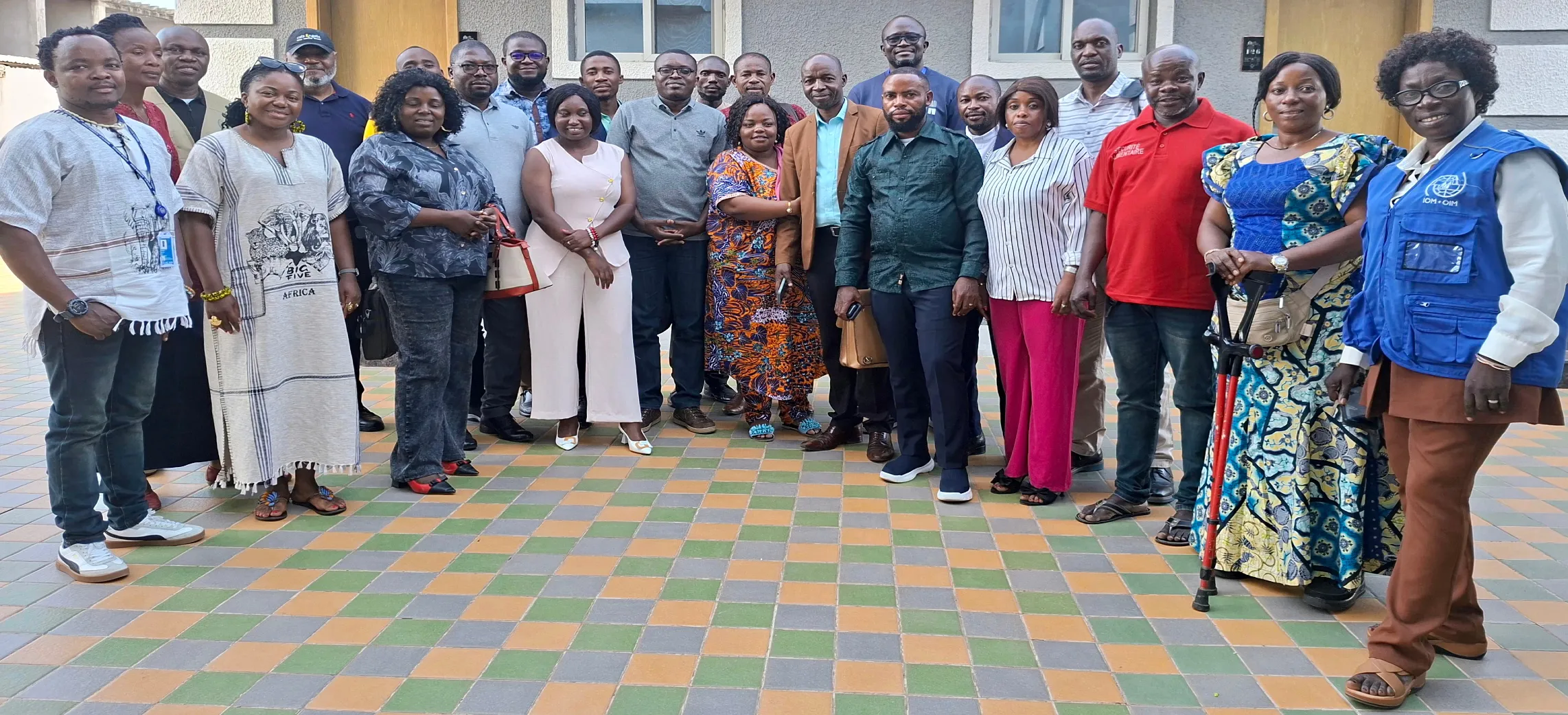 Strengthening capacities of the Tanganyika MHPSS TWG: Group work sessions and final group photo from a capacity-building workshop for members of the Provincial MHPSS Technical Working Group members in Tanganyika Province