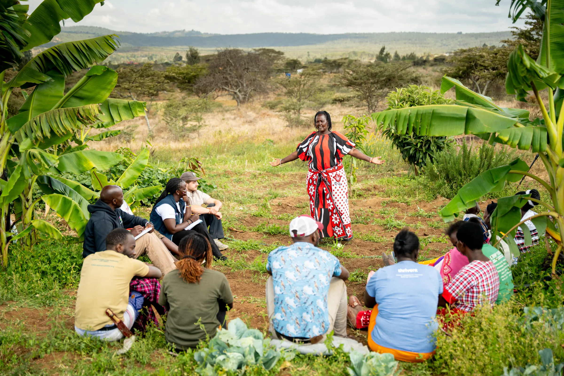 Group of women farmers in Kenya in a meeting on their field